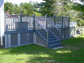 Composite deck built around above ground pool