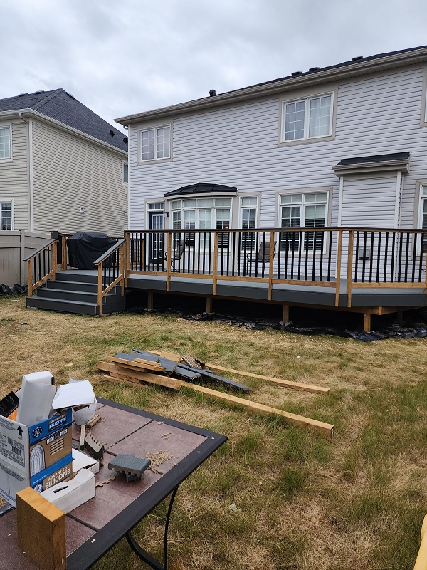 Composite deck with PT railings
